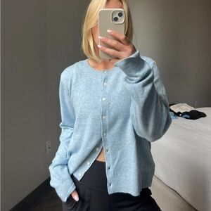 Blue button up sweater